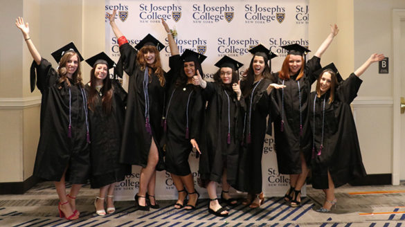 SJC Brooklyn 2018 graduates celebrating.