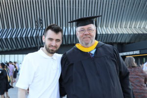 Two men at commencement.