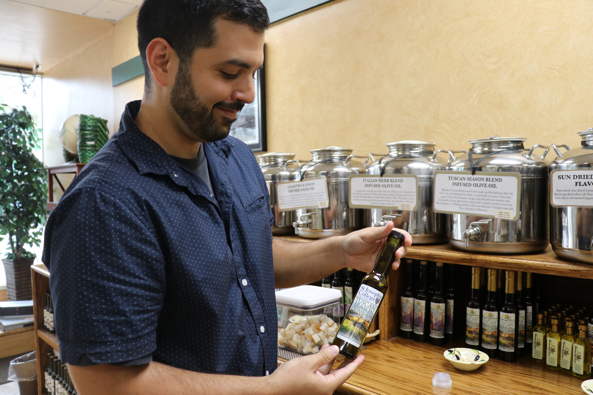 Steven Munoz ’10, owner of Amazing Olive in Patchogue.