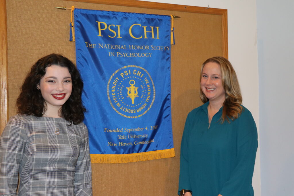 Rachel Sullivan posing with Lynn McGoey, Ph.D, who advised Sullivan on her senior research and recommended her for the Psi Chi Grant Award.
